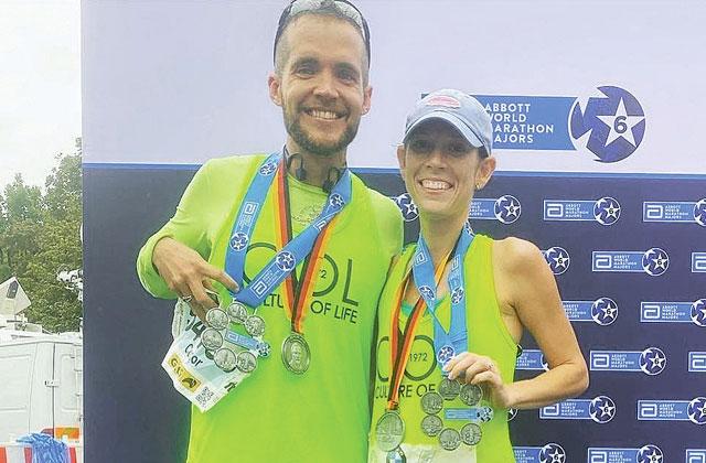 Celebration’s Conor Delaney, pictured with his wife Liz, is a veteran of the world’s biggest marathons. He’ll see a lot of the world running races later this month. (Submitted Photo)