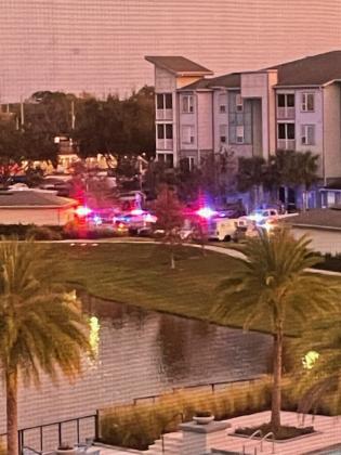 Osceola County Sheriff's deputies spent most of Friday responding to the standoff situation at The Jamison in Kissimmee. (Photo/Toni Rowan)