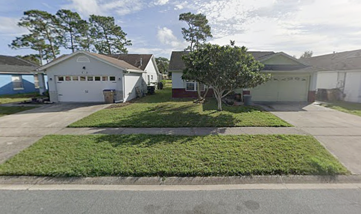 Sheriff's investigators say the suspect, who lives in the home on Indian Point Circle on the right, shot the victims out front of the vacation rental home next door on the left. (Google Maps)