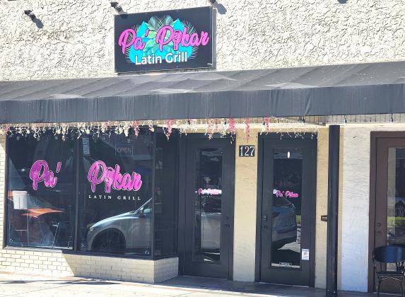 Pa’ Pikar sat dark during the lunch hour after police reported that Edsel Abad Rodriguez La Versa, 31, listed as owner/manager of the Latin bar and grill, and Joshua David Lopez Pena, 31, were arrested Friday. (Photo/Ken Jackson)