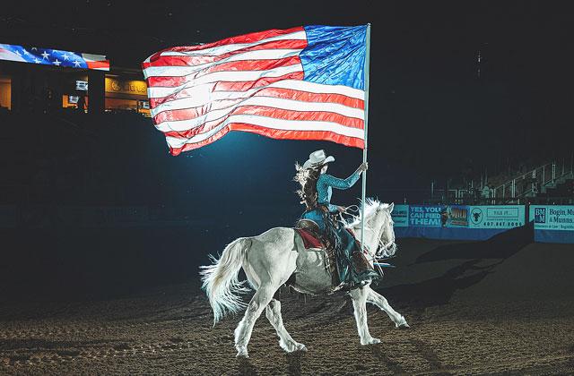 A Silver Spurs Rodeo queen got the festivities off to a patriotic start Thursday. (Photo/Taylor McFee).