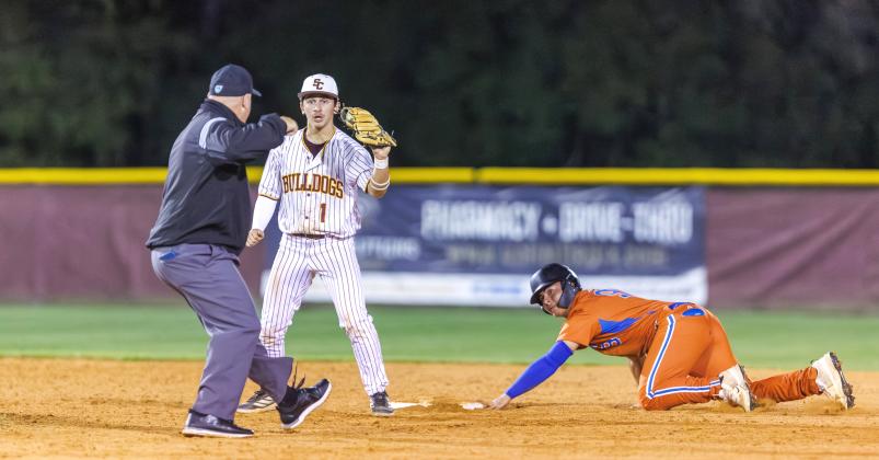 St. Cloud's Nathan Bianco makes the tag on Harmony's Yadiel Ruiz at second to keep the game close. (Photo/Taylor McFee)