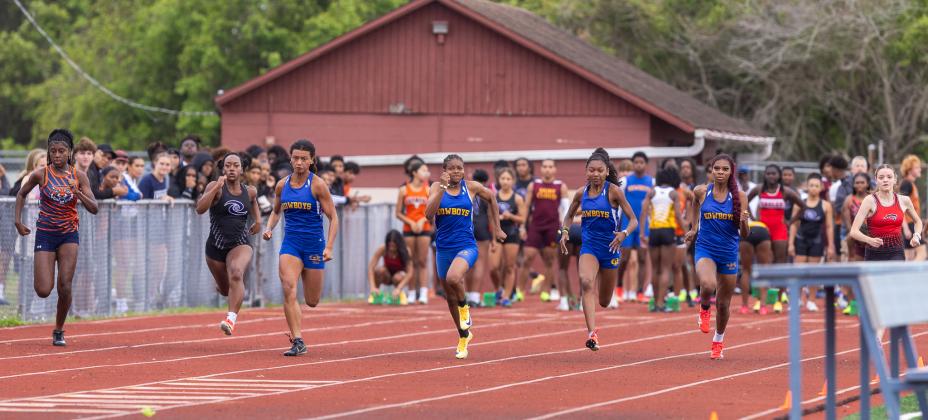 Kowgirl Stampede: Ziannah Gooden, Nicole Oliveira, Norelena Forde and MaKenzie Moore topped the 100 and 200 meter sprints to pace Osceola to its first OBC girls team title since 2019. (Photo/Taylor McFee)