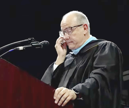 Retiring Gateway High Principal James Long wipes away a tear as commencement concluded Thursday. (Photo/School District of Osceola County)