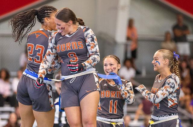 Harmony players found the end zone three times in Friday’s 39-19 Class 4A state semifinal loss to Lennard, giving Khloe Cook-Osani (9), Jada Bloodworth (11) and Ellah Husbands (23) reason to celebrate. (Photo/Taylor McFee)