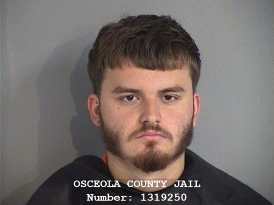 Christian Andres Rivera was arrested early Tuesday and charged with two counts of attempted murder, discharging a gun from a vehicle and fleeing and eluding police. He was booked into the Osceola County Jail.