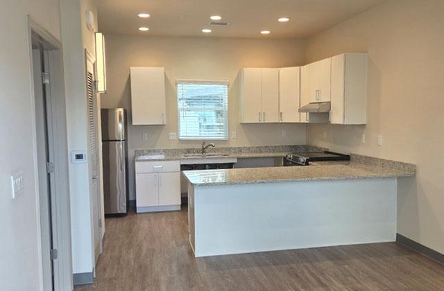 The 60 units at Buen Vecino feature 12x12 living rooms and bedrooms, walk-in showers and in-room washers and dryers. (Photo/Ken Jackson)