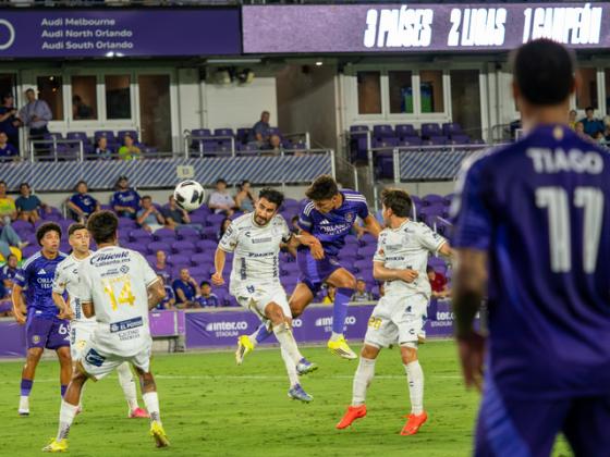 Justin Ellis scores a header in the 69th minute from a cross from Tiago. Photo by Mario Casamalhuapa