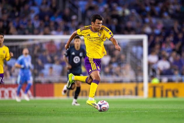 Justin Ellis making an assist to Antoine Griezmann for a goal. Photo by Mark Thor Orlando City SC Staff Photographer