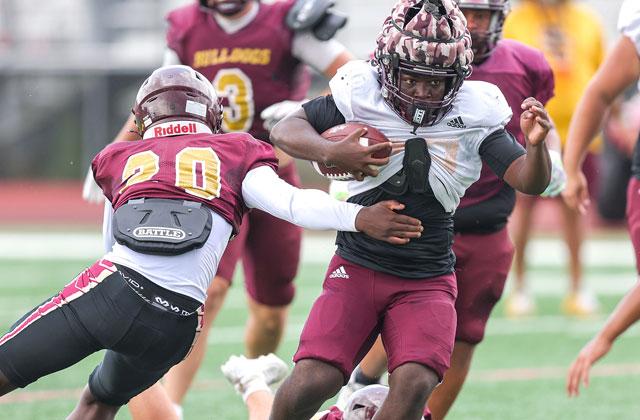 It’s already intense at St. Cloud High preseason football camp; the Bulldogs are working their way toward the Kickoff Classic next Friday night at East Ridge. (Photo/Taylor McFee)