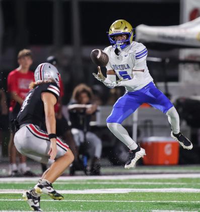 Osceola's Amir Davis snares a second-quarter interception, part of a dominant defensive effort that included four turnovers and five sacks. (Photo/Taylor McFee)