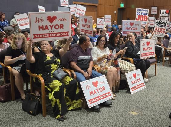 Kissimmee Mayor Jackie Espinosa sits among family and supporters at the Aug. 18 City Commission meeting, where two of four City Commissioners voted to advance impeachment hearings when three votes were needed. The Florida Commission on Ethics announced Wednesday a finding of probable cause of wrongdoing. (Photo/Ken Jackson)