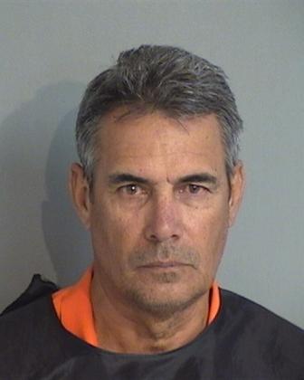 Ivan Oscar Martinez-Garcia, 56, was arrested Monday and charged with felony counts of capital sexual battery on a victim under 12 by a person 18 years of age or older in a familial or custodial position, lewd or lascivious molestation of a victim less than 12 years of age by an offender 18 years of age or older and showing harmful material to a minor. (Mugshot/Osceola County Jail)