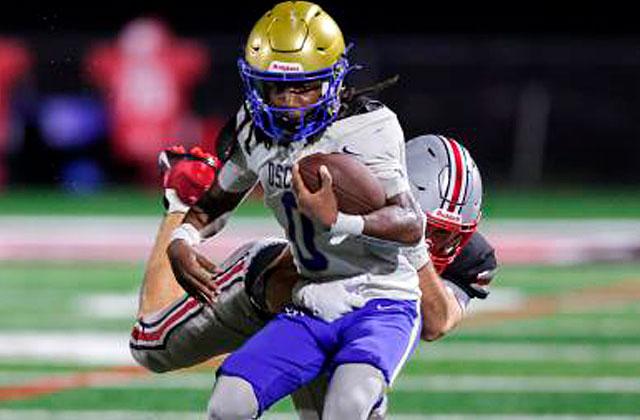 Osceola's Javontay Barnett, shown here in last week's win at Lake Mary, scored on a six-yard TD scamper on the last play of Friday's loss to Lakeland. (Photo/Taylor McFee)