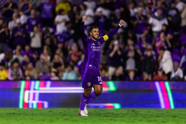 Martín Ojeda scores and acrobatic goal and celebrates. Photo by Mark Thor OCSC staff photographer