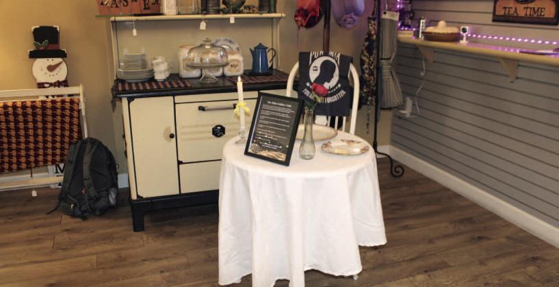 The Daughters of the American Revolution presented a “Missing Man” table at a Veteran’s Day event Saturday, honoring the soldiers who didn’t return home from Vietnam. See more Veterans Day photos on Page 16. PHOTO/TERRY LLOYD