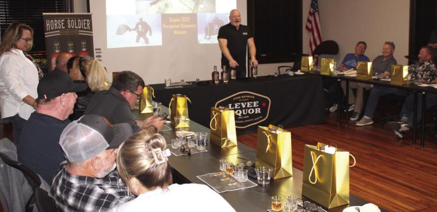 HS-2 Retired Lt. Col. Rob Schaefer discusses a mission undertaken by the distillery team to recover remains from a U.S. aircraft shot down in the South Pacific during World War II. His distillery manufactures Horse Soldier Bourbon. PHOTOS/TERRY LLOYD
