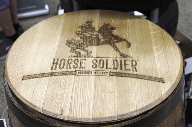 HS-2 Retired Lt. Col. Rob Schaefer discusses a mission undertaken by the distillery team to recover remains from a U.S. aircraft shot down in the South Pacific during World War II. His distillery manufactures Horse Soldier Bourbon. PHOTOS/TERRY LLOYD