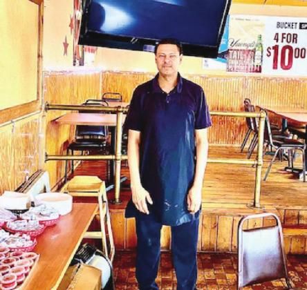 Zahir Ally is the general manager of PG’s Wings and more. NEWS-GAZETTE PHOTO/BRIAN MCBRIDE