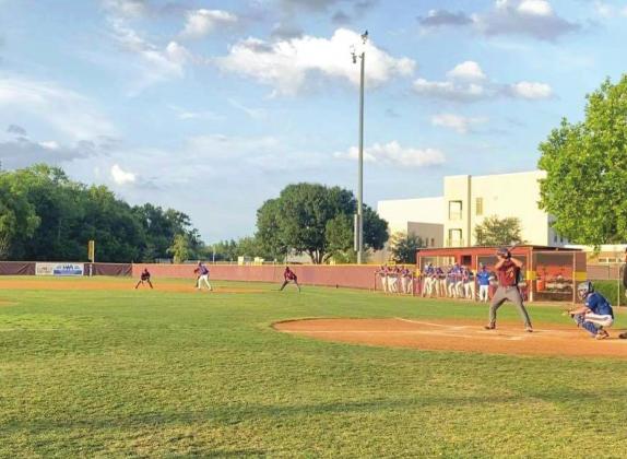 St. Cloud junior Chris Palmi steps to the plate against Harmony’s Caden Scarborough. Palmi won the battle with a single, but Scarborough pitched a complete game as the Longhorns won 5-3 to capture the Class 6A, District 6 Championship. PHOTO/CARRIE PALMI