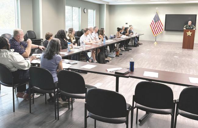 Undersheriff Ron Roberts of the Osceola County Sheriff’s Office welcomes members of the Seeds of Hope Osceola coalition to the Sheriff’s complex Thursday. (Photo/Terry Lloyd)