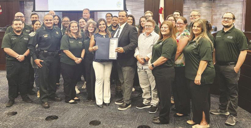 On Monday, Osceola County honored the Sheriff’s Office’s 911 communications team as a group, and Norris “Dog Guy” Bourne for his individual acts of kindness along Pleasant Hill Road. PHOTOS/KEN JACKSON