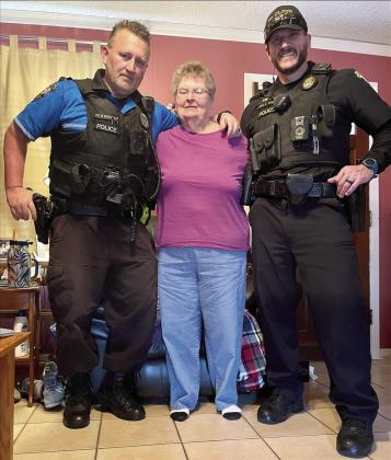Betty Webb with Officer Michael MacDonald and Corporal Lawrence Wall of the St. Cloud Police Department. PHOTO/COUNCIL ON AGING