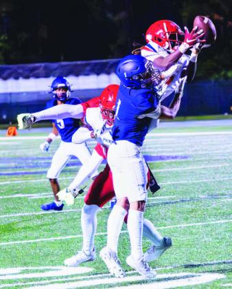 Poinciana receiver Jaeden Gerard goes up for a catch against in the Eagles’ 34-14 win at Celebration Friday. PHS meets its second straight county foe this week at Harmony. PHOTO/MARIO CASAMALHUAPA