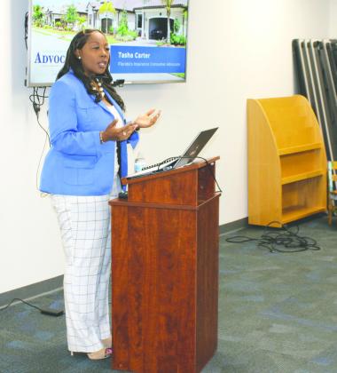 Tasha Carter, the State of Florida’s Insurance Consumer Advocate, briefs residents on the current state of Florida’s property insurance market. PHOTO/TERRY LLOYD