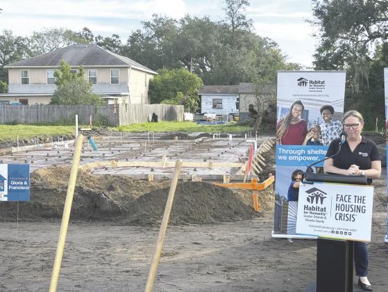 Habitat for Humanity celebrated the groundbreaking of its first Osceola County house build last week, and expects to have it move-in ready by Christmas despite just having a foundation currently. PHOTOS/DAVID CHIVERS
