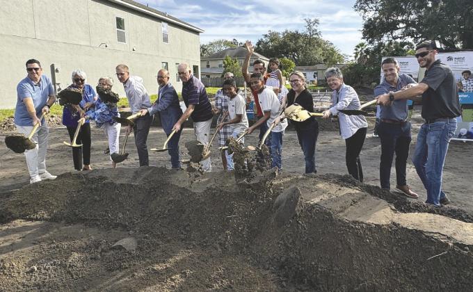 Habitat for Humanity celebrated the groundbreaking of its first Osceola County house build last week, and expects to have it move-in ready by Christmas despite just having a foundation currently. PHOTOS/DAVID CHIVERS