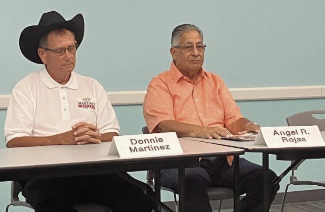 Republican Donnie Martinez and Democrat Angel Rojas were among the panelists at a forum of Osceola County Sheriff candidates last week at Kissimmee’s Hart Memorial Library. PHOTO/DAVID CHIVERS