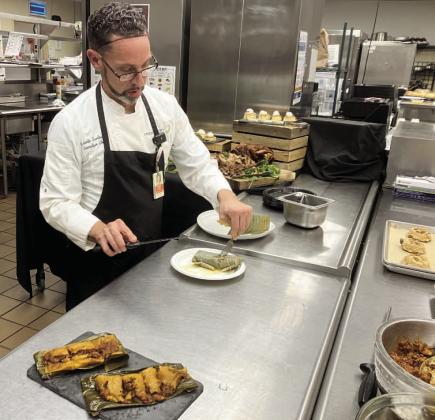 Orlando Health St. Cloud Executive Chef Roberto Santiago demonstrates how to make pasteles, a popular dish in the Hispanic community during the Christmas holidays. PHOTO/TERRY LLOYD