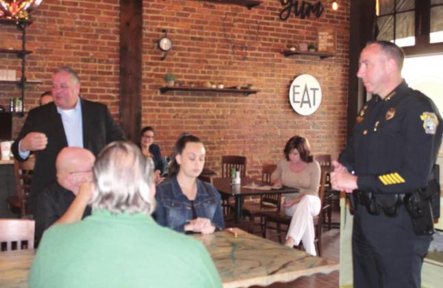 St. Cloud City Manager Bill Sturgeon, left, and Police Chief Doug Goerke talk about the city’s growth management during a public forum last week. PHOTO/KEN JACKSON