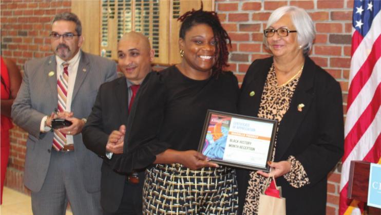 Above: Pastor Roxanne Harvey from Real Love International Ministries was honored by City Commissioner Olga Gonzalez.