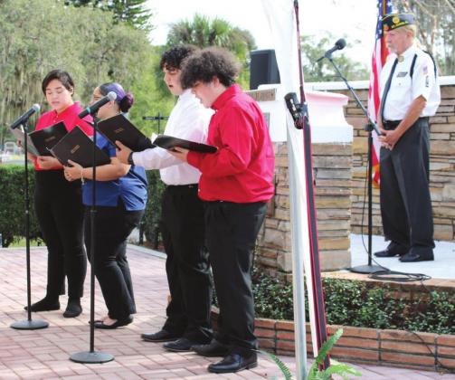 Students from the Osceola School of the Arts performed an a capella rendition of the Armed Force Medley.