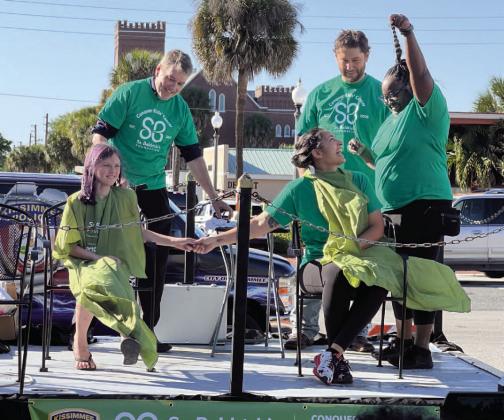 Local barbers donate their time to shave and cut hair at Rock the Bald, the St. Baldrick’s annual event to raise funds for pediatric cancer research. SUBMITTED PHOTO