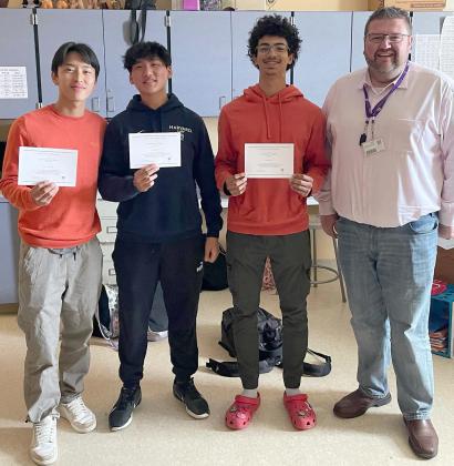Celebration High senior Aiden Dai (second from left, inset) was one of three National Merit Scholar finalists, pictured with CHS Principal Chris Todd. PHOTO/CELEBRATION HIGH SCHOOL 