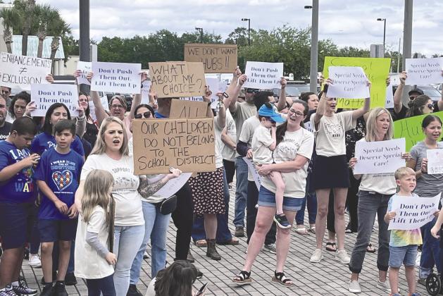 Parents protested before an April School Board meeting, opposing impending changes to the District’s Exceptional Student Education program model.