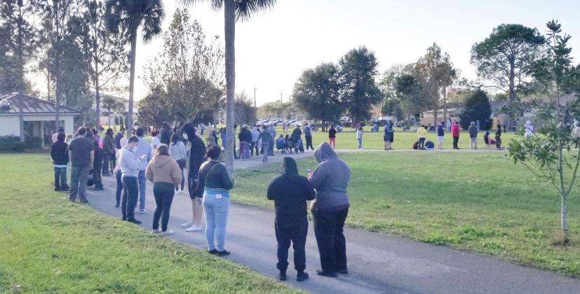 Tuesday, hundreds line up in a hours-long wait for COVID-19 testing at the 65th Infantry Park. PHOTOS/KEN JACKSON