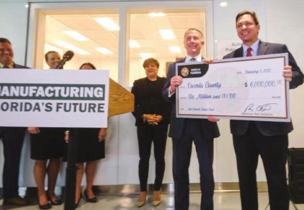 The $6 million state grant toward building Neovation Way, the road to connect NeoCity south to Neptune Road, is an example of the new “Be First to What’s Next” Osceola motto. PHOTO/OSCEOLA COUNTY