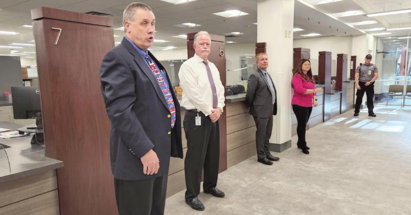 From left, Osceola Deputy Administrator Ken Brown, Community Development Director Ray Stangle, Deputy County Manager Darren Gray and County Commissioner Peggy Choudhry give residents a tour of the county’s renovated administration center Monday. PHOTO/KEN JACKSON