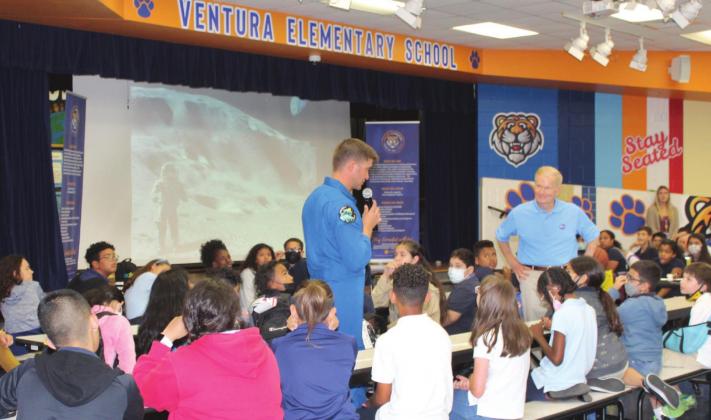 NASA Astronaut Matthew Dominick (with microphone) and former Sen. Bill Nelson, now NASA’s lead administrator, interact with Ventura Elementary School students Monday. PHOTO/KEN JACKSON