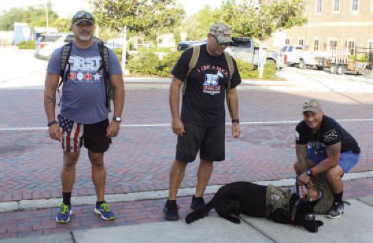 Megatron the dog and fellow ruck marchers make ready. PHOTO/TERRY LLOYD