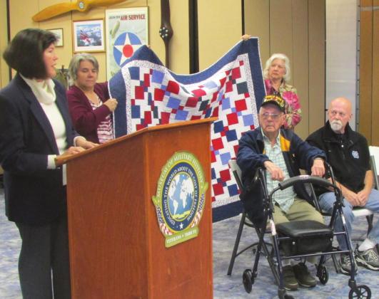 Museum of Military History and Melissa Matthews of Quilts of Valor presents Robert Kemp Sr. with his quilt. NEWS-GAZETTE PHOTO /TERRY LLOYD
