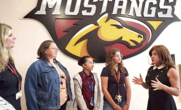 St. Cloud Middle School students Allayah Rodriguez, Ella Wetzel, Evangeline Morrero Mosa and teacher Morghan Cameron were honored last week for winning state Rep. Paula Stark’s “Build a Bill” contest; their legislation will go to Tallahassee this session. SUBMITTED PHOTO