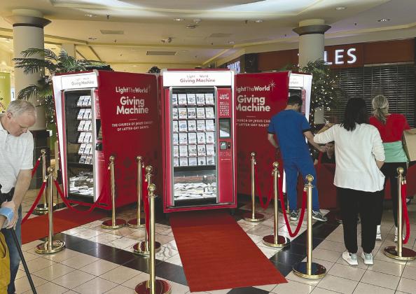 The Church of Jesus Christ of Latter-day Saints-sponsored Giving Machine to help local charities will again appear this holiday season. While at Altamonte Mall, local leaders are hoping to host one in Osceola County soon. (Submitted photos)