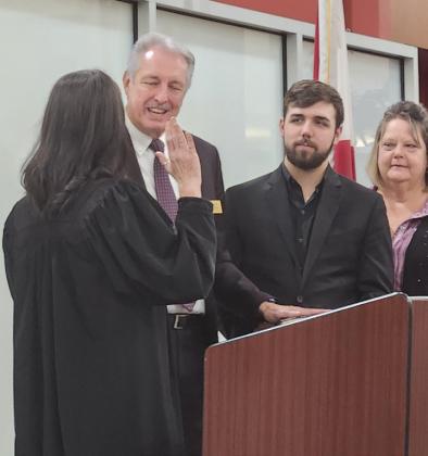 Supervisor of Elections Mary Jane Arrington were sworn in for their fifth terms, and Tax Collector Bruce Vickers his third, this week, joined by their families. PHOTO/KEN JACKSON