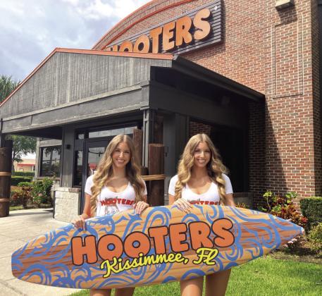 Kissimmee twins Amber and Holly Diaz both qualified to compete for the title of Miss Hooters International this month at the competition in Fort Worth. PHOTO/DAVID CHIVERS