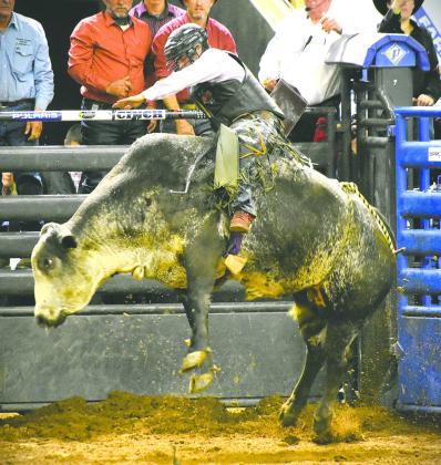 Okeechobee’s Daron Powers won the bull riding with an 83.5-point ride. PHOTO/KATIE WILLIAMS